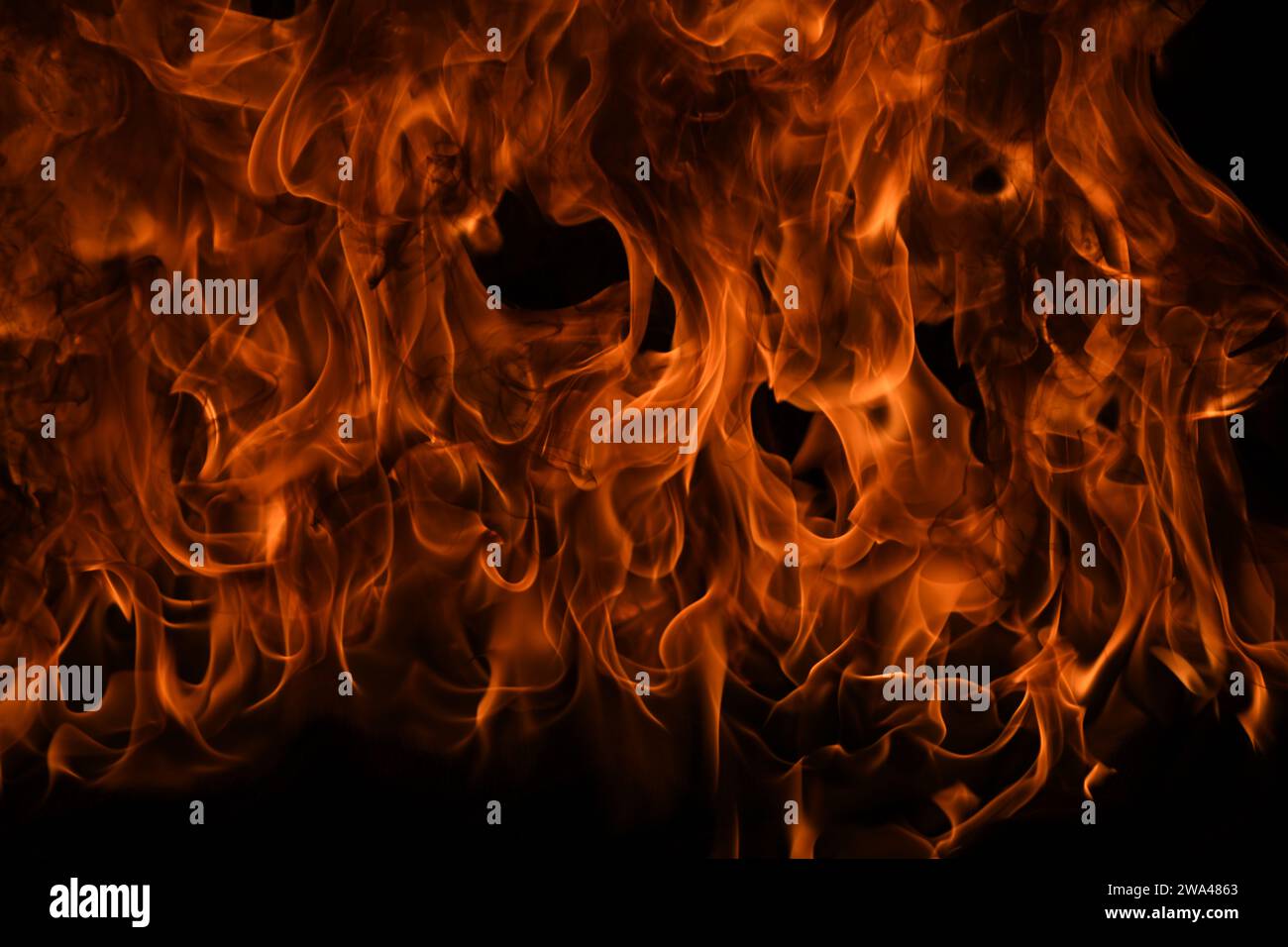 Fire flame motion pattern abstract texture. Burning fire, flame overlay background. Stock Photo