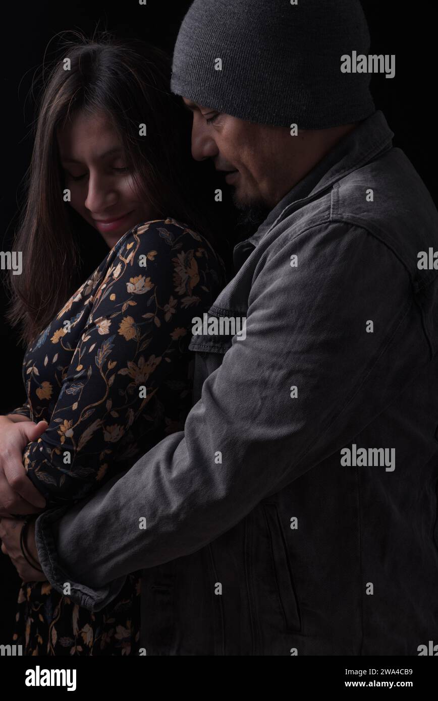 Man hugs woman hi-res stock photography and images - Alamy