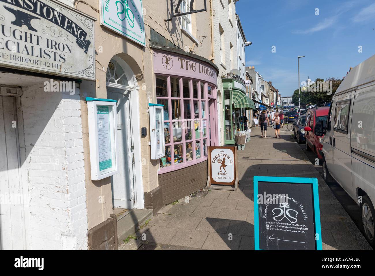 Bridport Dorset sunny September 2023 day with shops and stores on South