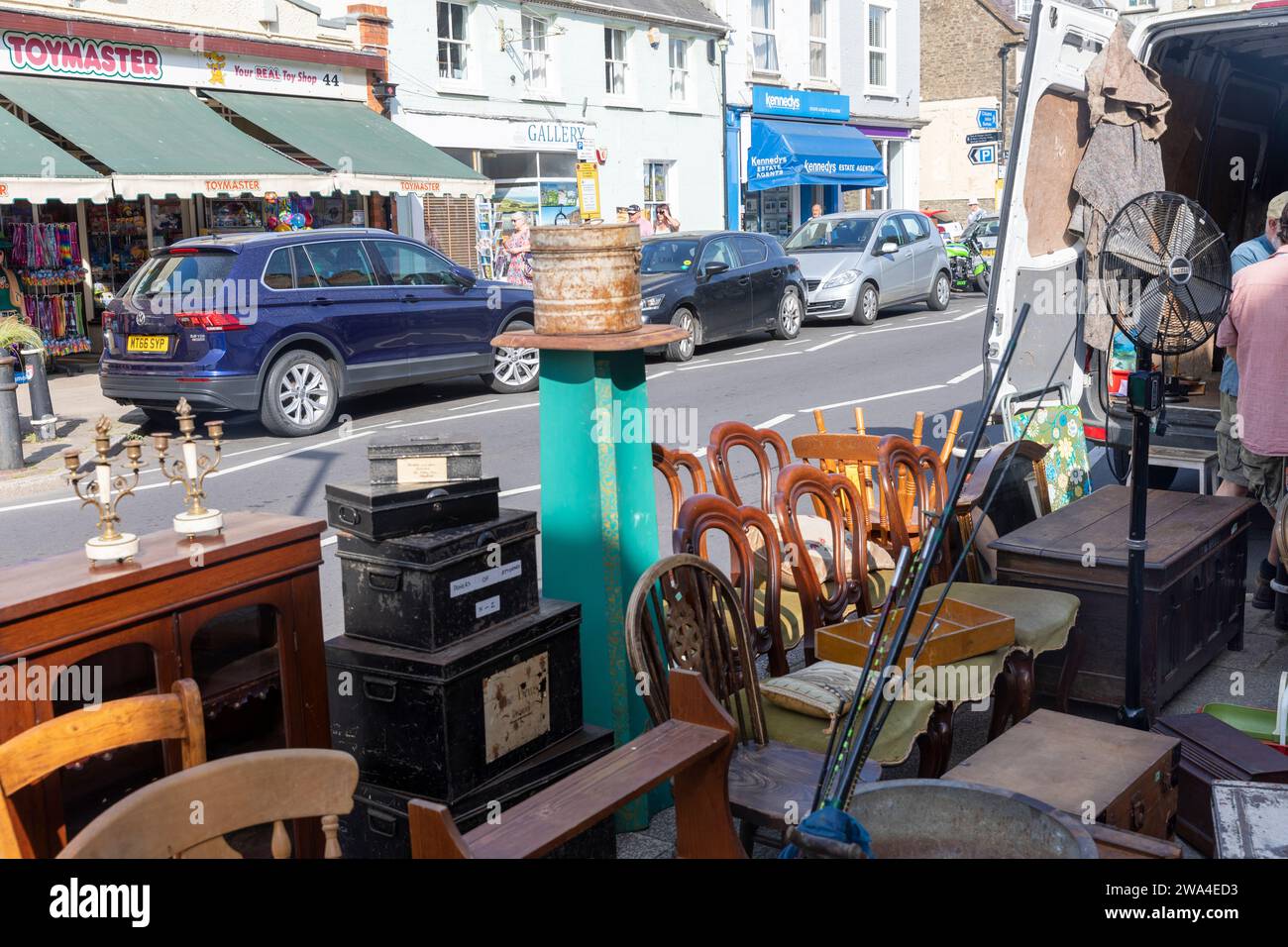 Bridport Dorset, market day and furniture for sale at a market stall in