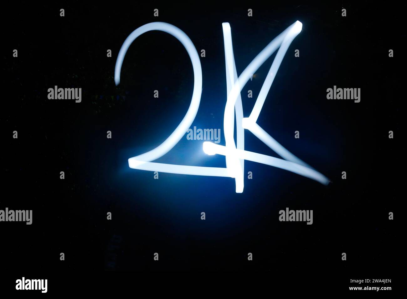 2K word sparkler on black background. Stock Photo