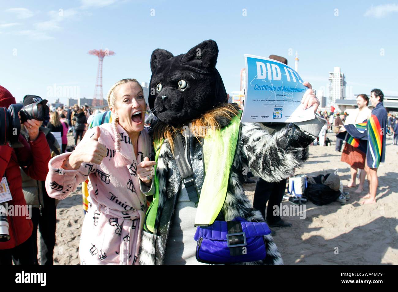 New York, United States. 01st Jan, 2024. Swimmers are taking part in the annual New Year's Day ''polar bear plunge'' at Coney Island Beach in New York, on January 1, 2023. The 121st annual Coney Island Polar Bear Club New Year's Day Plunge is drawing over 4000 participants who are braving the freezing Atlantic waters. The event, which began in 1903, is raising funds to support local non-profit organizations in the southernmost tip of Brooklyn, New York. (Photo by Deccio Serrano/NurPhoto)0 Credit: NurPhoto SRL/Alamy Live News Stock Photo