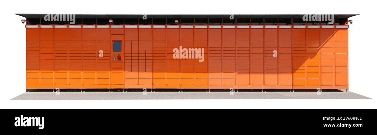 Self service long orange color terminal from which customers can pick up and ship mails and packages. Isolated Stock Photo