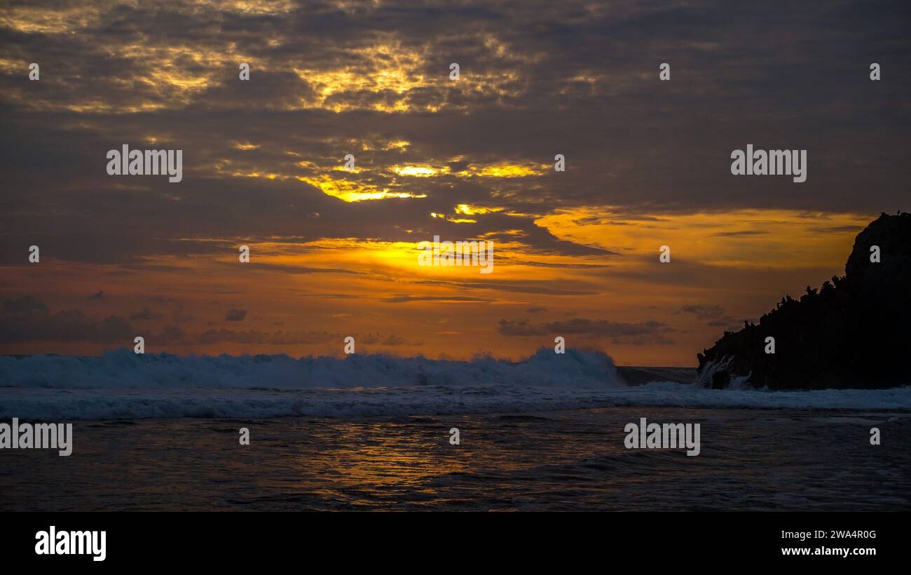 Beautiful sunset at Kukup Beach in Central Java, Indonesia Stock Photo ...