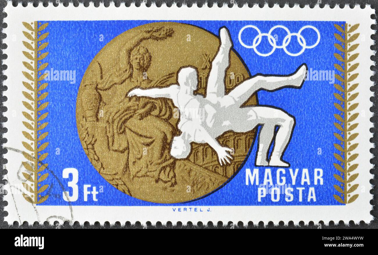 Cancelled postage stamp printed by Hungary, that shows Wrestling, Summer Olympic Games 1968 - Mexico City,  circa 1969. Stock Photo