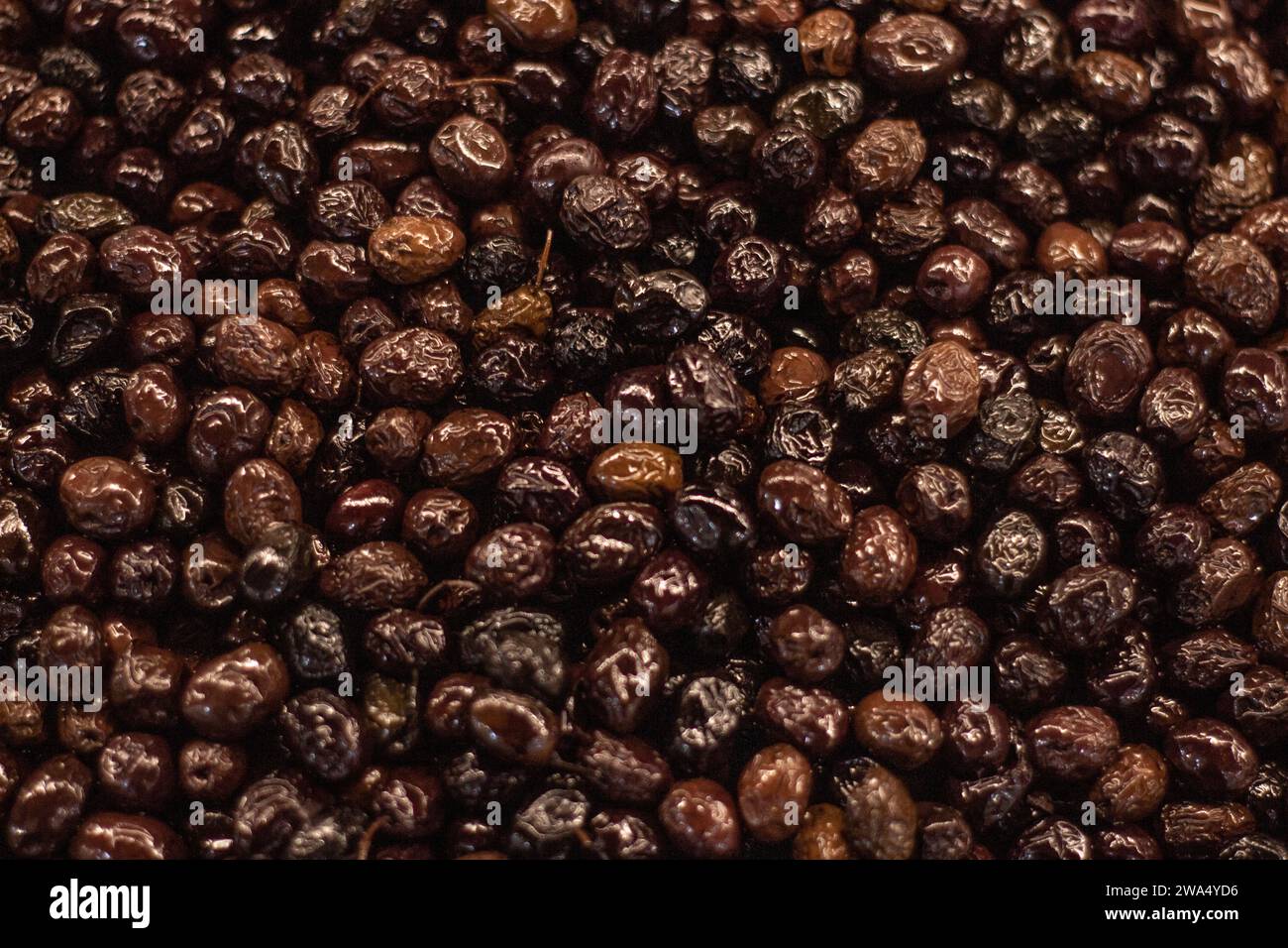dried olives on the counter of the supermarket Stock Photo