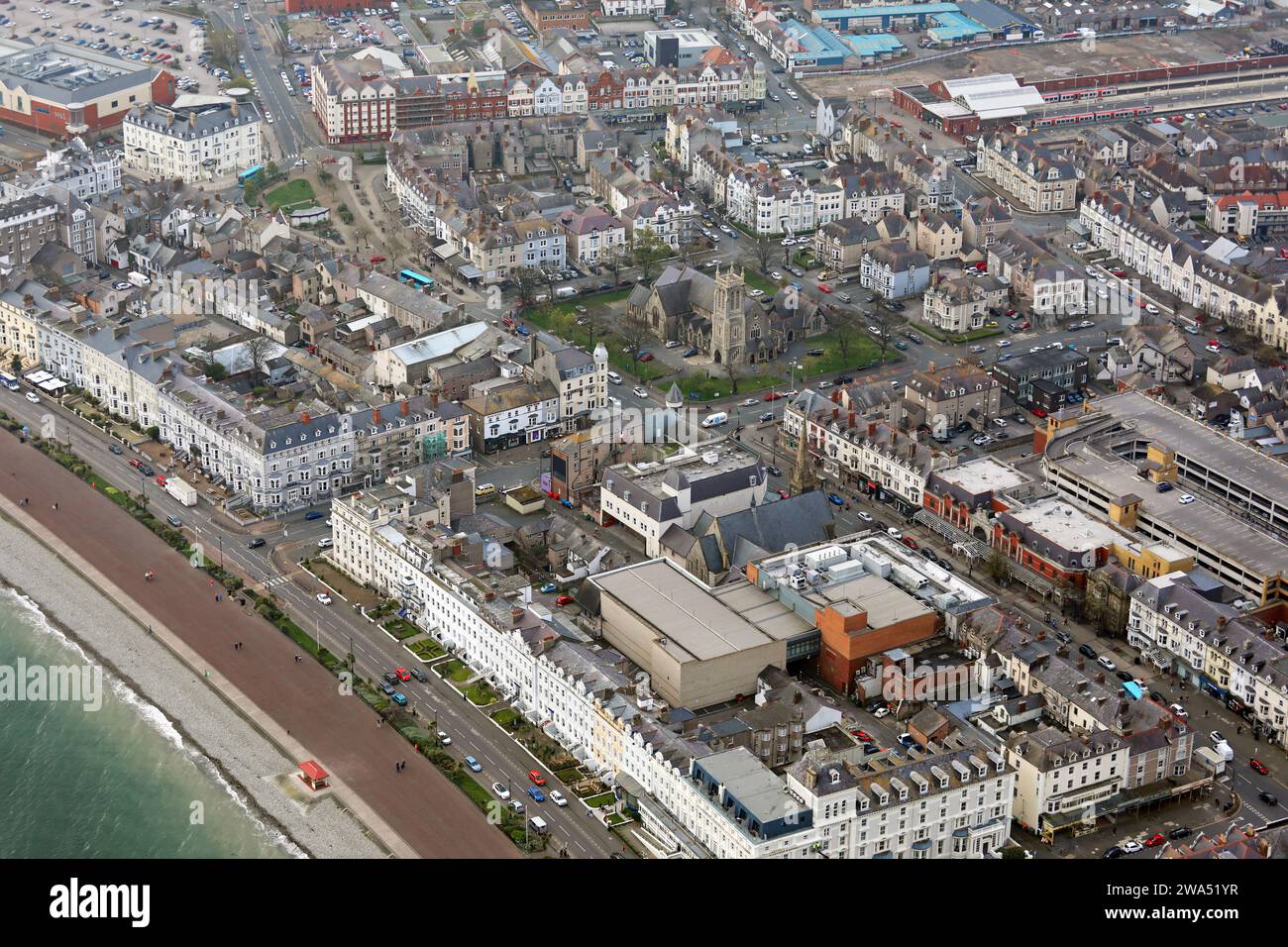 Aerial view of Llandudno town centre. The seafront is bottom left and this shot looks across St George's Crescent towards Trinity Square. Stock Photo