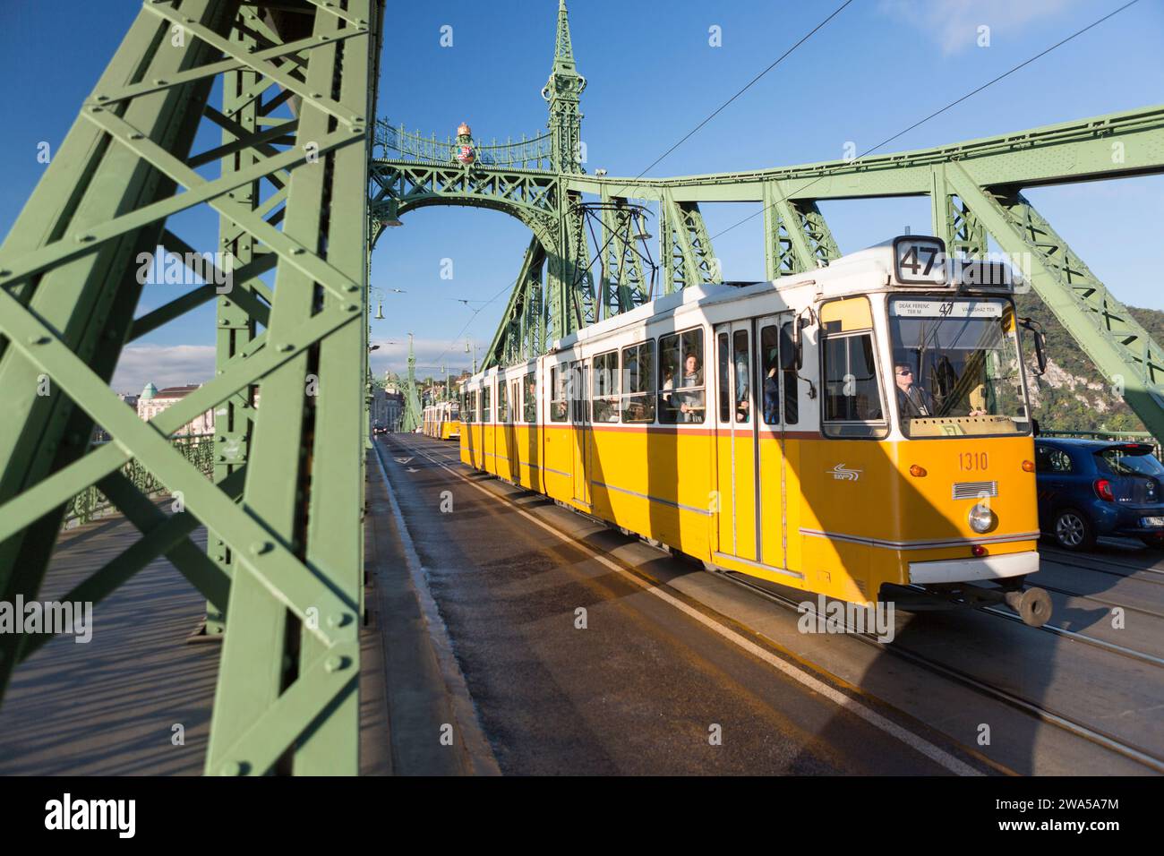 Hungary, Budapest, city tram going over the  Liberty Bridge over the river Danube. Stock Photo