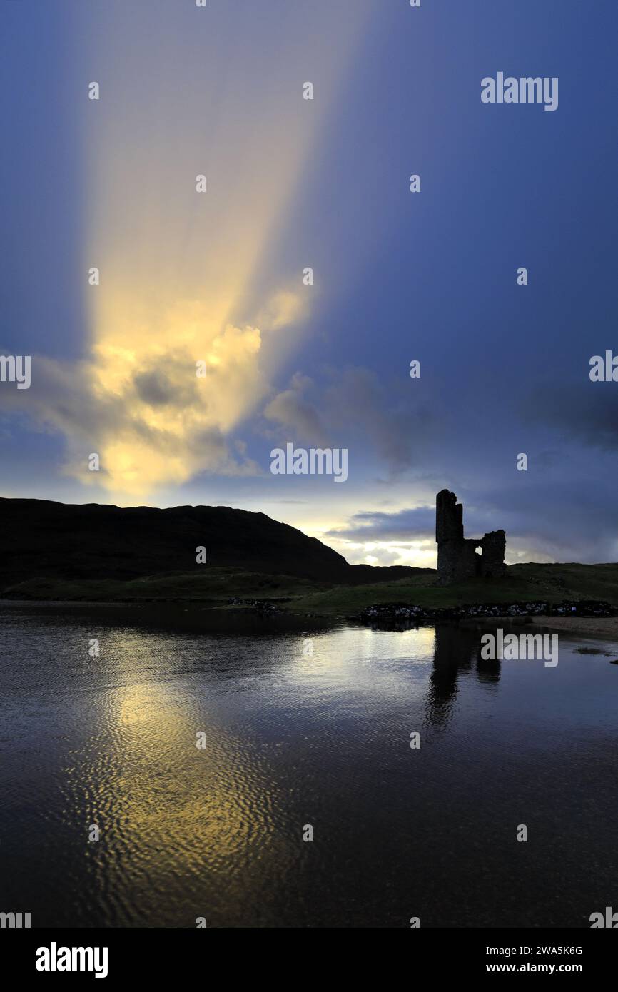 Sunset view over Ardvreck Castle on Loch Assynt, Sutherland, North West Scotland, UK Stock Photo