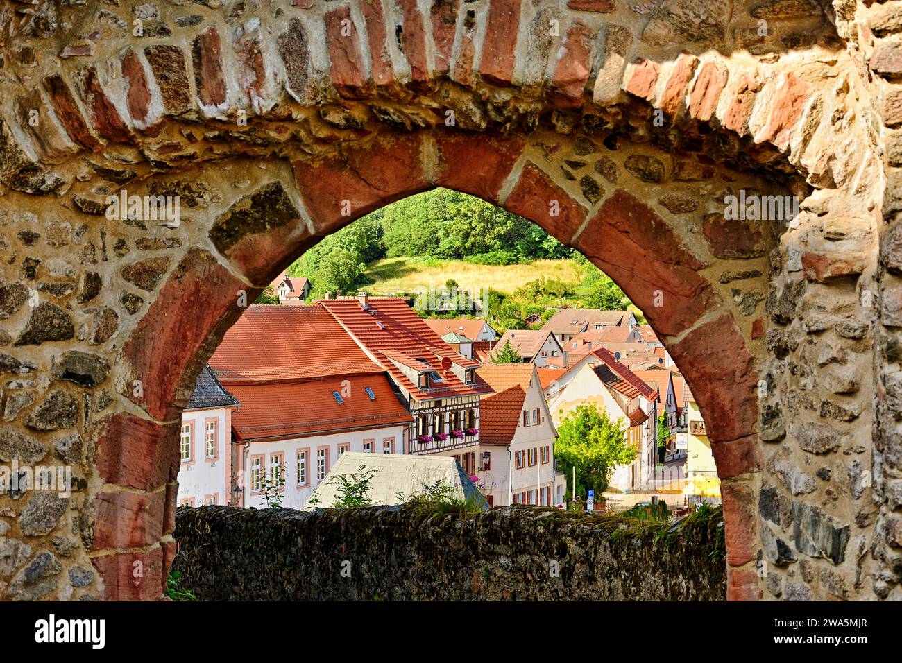 View through the gate of the Lindenfels castle wall to the historic old town, Odenwald, Germany Stock Photo
