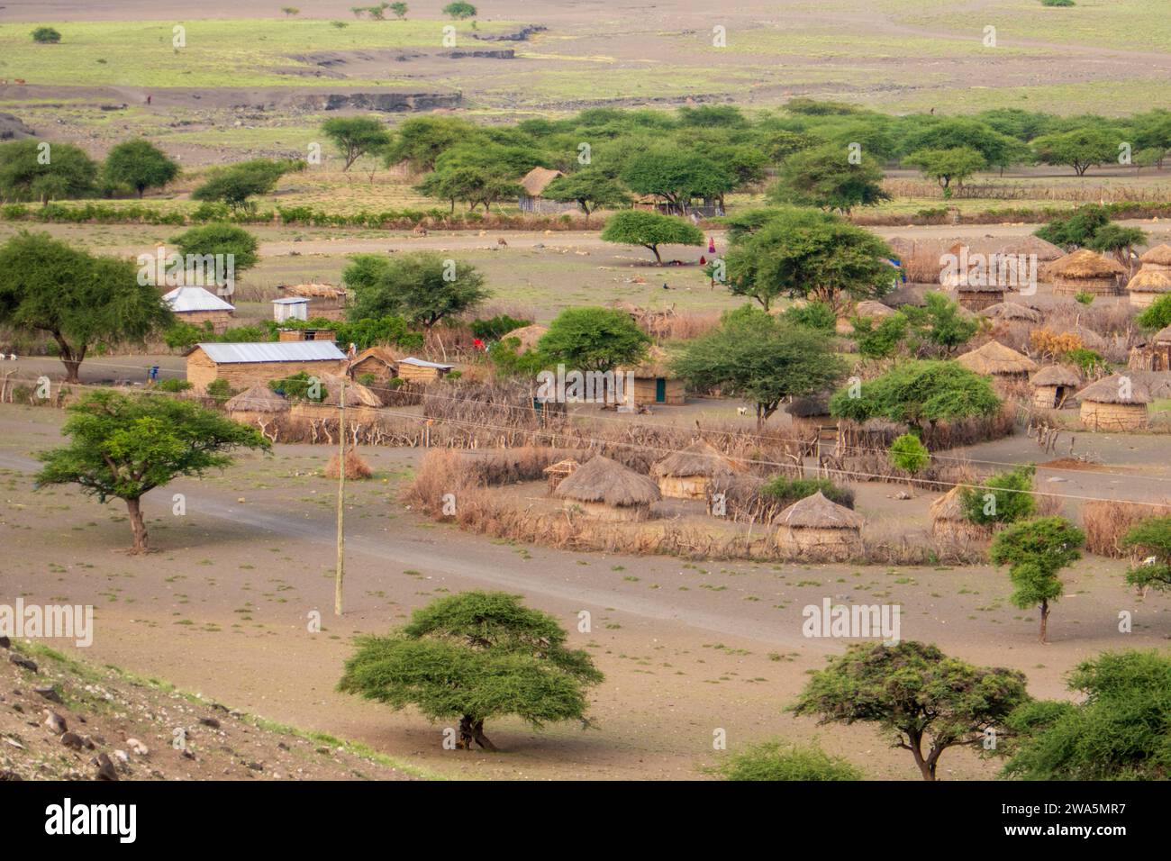 View of masai village at Mount Ol Doinyo Lengai in Tanzania Stock Photo