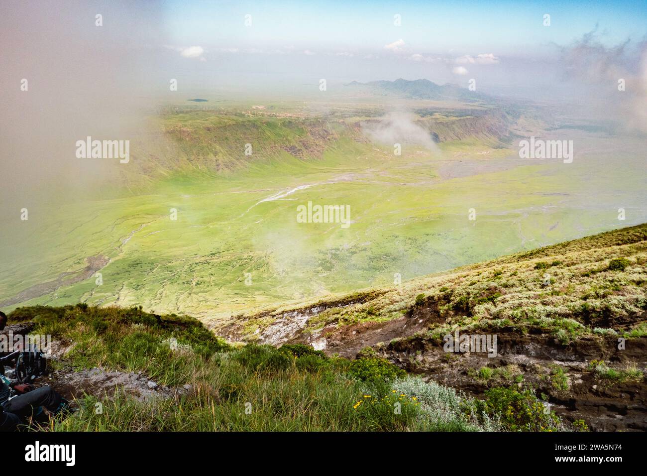 View of volcanic rock formations in Rift Valley seen from Mount Ol Doinyo Lengai in Tanzania Stock Photo
