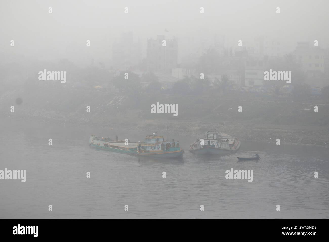Dhaka, Bangladesh - January 01, 2023: Everywhere is covered in a blanket of fog in winter morning at Saver in Dhaka. Stock Photo