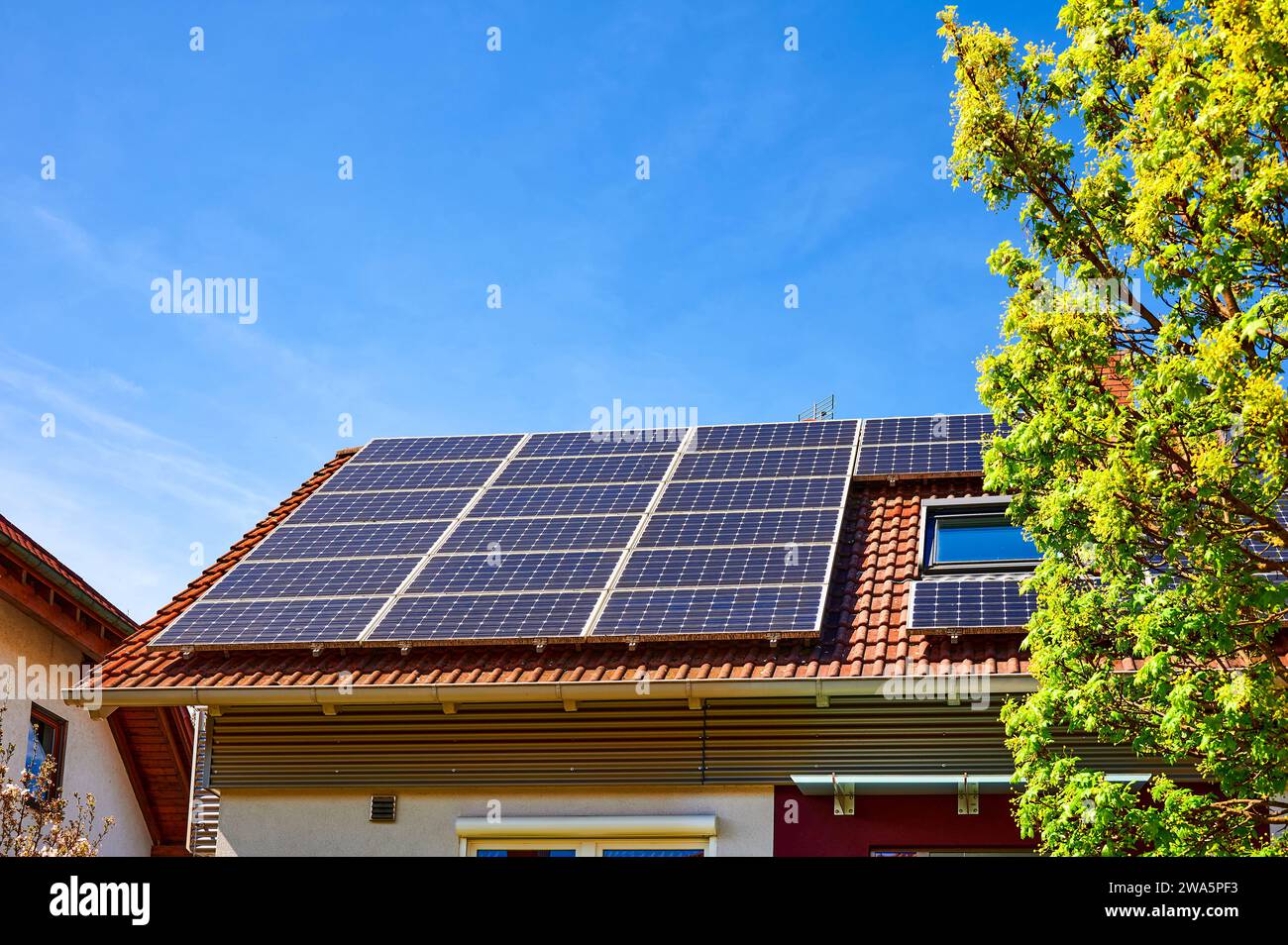 Solar cells on house roof hi-res stock photography and images - Alamy