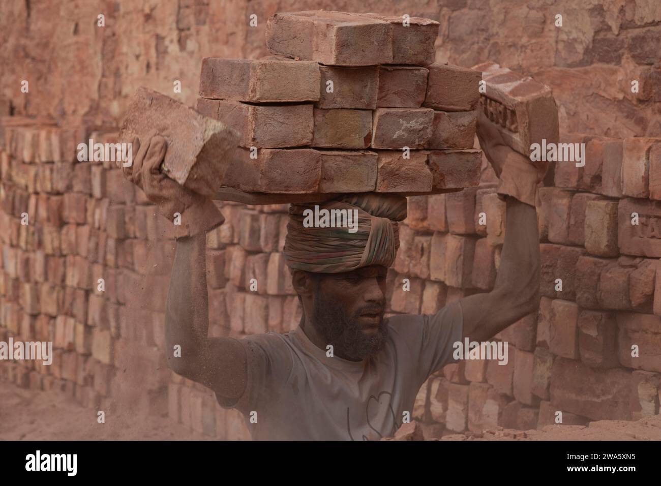 Dhaka Dhaka BANGLADESH 2nd Jan 2024 Seasonal Migrant Workers Make   Dhaka Dhaka Bangladesh 2nd Jan 2024 Seasonal Migrant Workers Make Bricks At A Factory On A Winter Morning In Dhaka Bangladesh Without Wearing Masks Or Following Safety Measures In A Dusty Environment Credit Image Fatima Tuj Johorazuma Press Wire Editorial Usage Only! Not For Commercial Usage! 2WA5XN5 