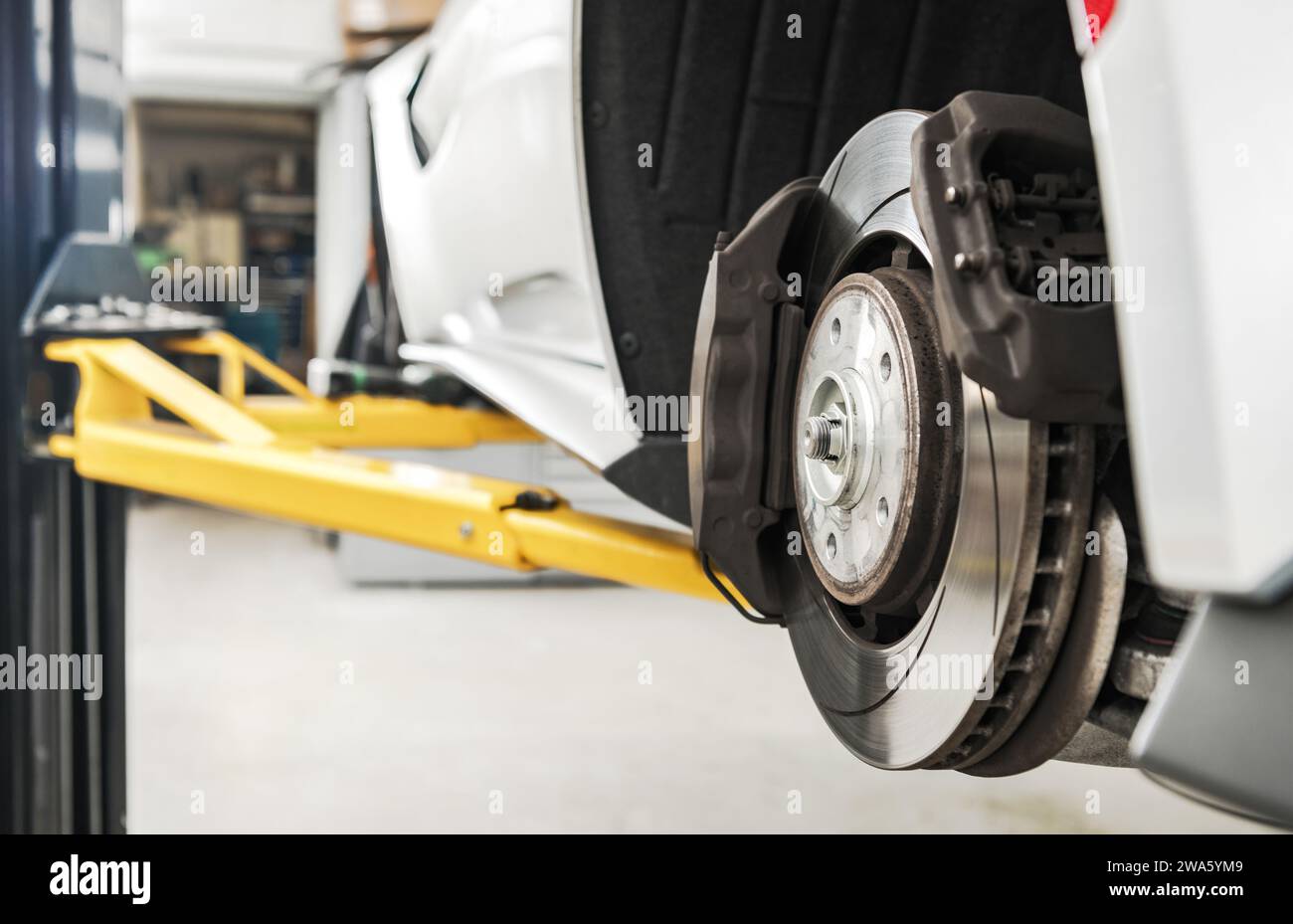 Replacing Brake Disc and Pads in a Modern Performance Vehicle Stock