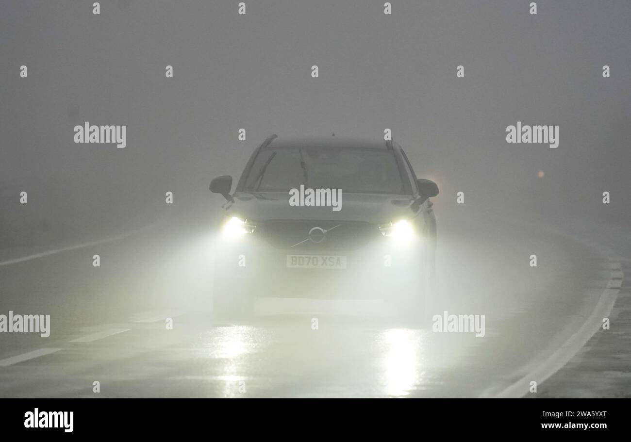 Drivers face difficult driving conditions on the A20 near Dover in Kent. The Met Office has issued an amber weather warning for Storm Henk, which is forecast to bring gusts of up to 80mph to parts of the UK. Picture date: Tuesday January 2, 2024. Stock Photo