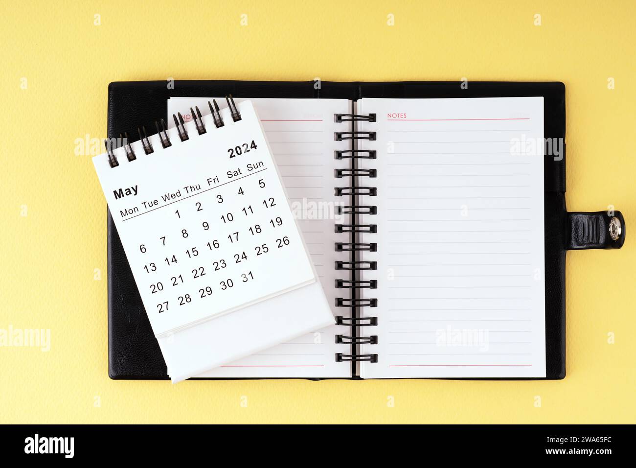May 2024 month calendar with table plant on yellow cover background.  Monthly calendar concept 21478646 Stock Photo at Vecteezy