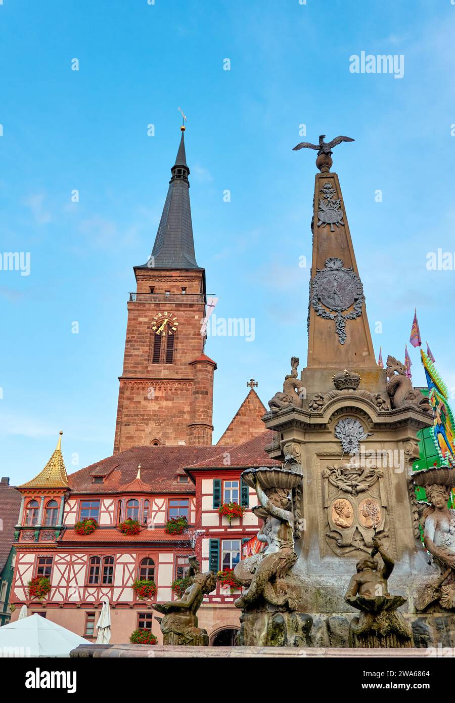 Beautiful fountain on Königsplatz (market square) in front of the town hall and tower of the town church in Schwabach, Middle Franconia Stock Photo