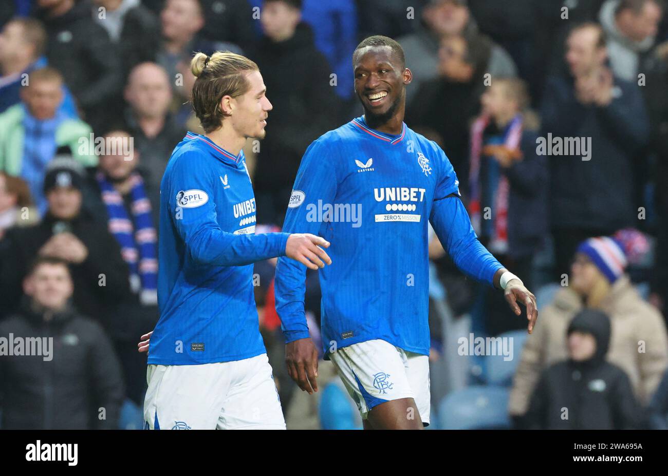 Rangers' Abdallah Sima (right) celebrates scoring their side's second ...