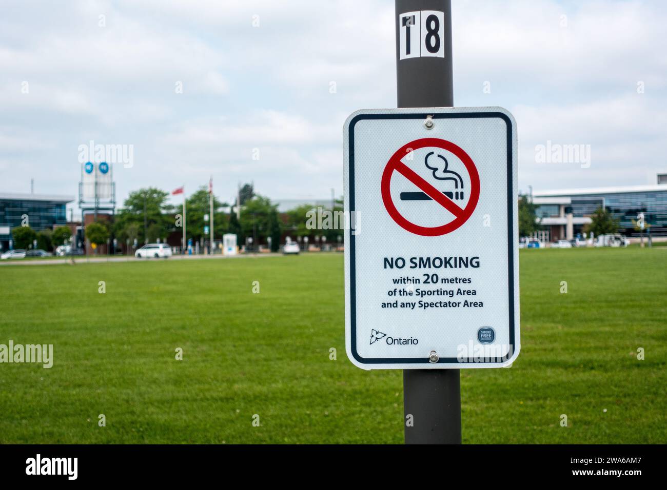 Smoking restriction in play field Stock Photo