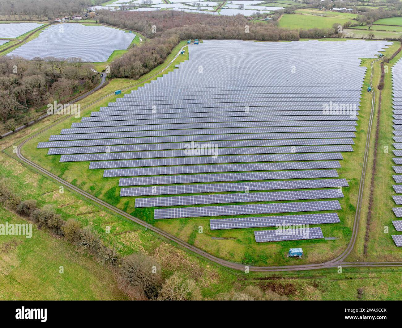 Aerial view of a large solar farm in Hampshire UK. Detailed view showing thousands of panels laid out in the British countryside. Stock Photo