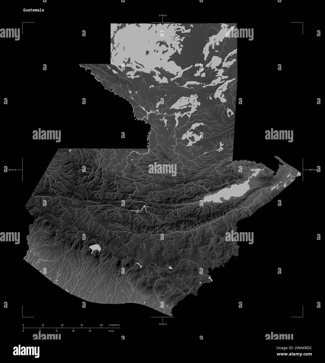 Shape of a Grayscale elevation map with lakes and rivers of the Guatemala, with distance scale and map border coordinates, isolated on black Stock Photo
