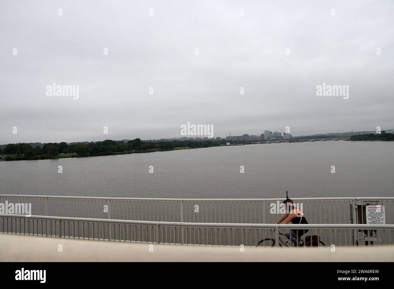 WASHINGTON D C/District of Columbia/USA./ 09 .May. 2019/ Female biker crossing over Potomac river in Washintong DC Photo..Francis Dean / Deanpictures. Stock Photo