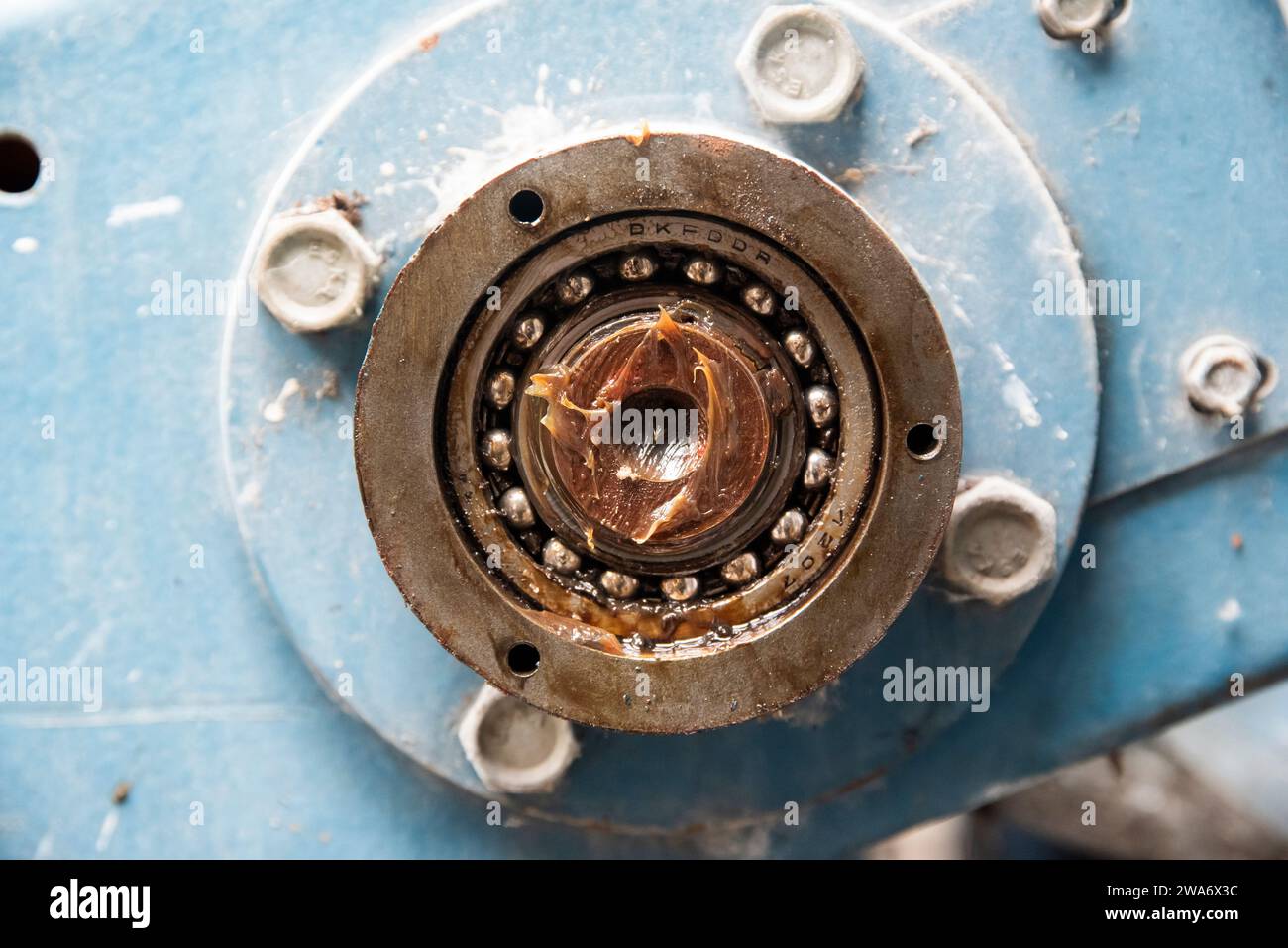 Old damaged bearing in the engine Stock Photo - Alamy