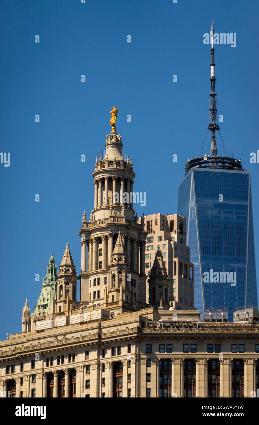 David Dinkins municipal building with the One World Trade Center in the background in downtown Manhattan NYC Stock Photo