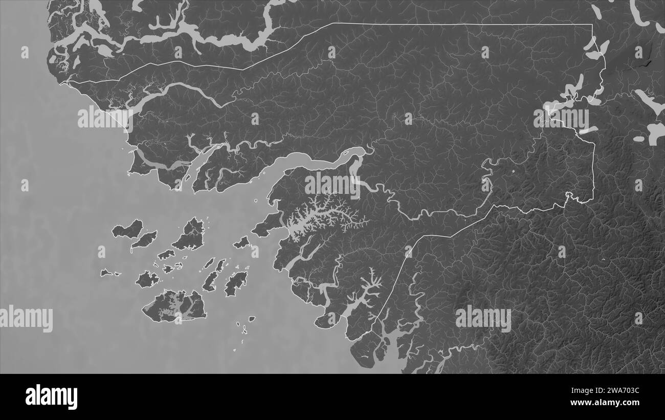 Guinea-Bissau outlined on a Grayscale elevation map with lakes and ...