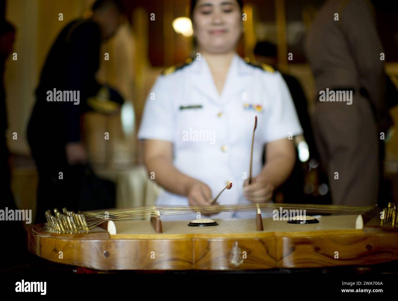 US military forces. A Thai Sailor plays the jackwood instrument during ...