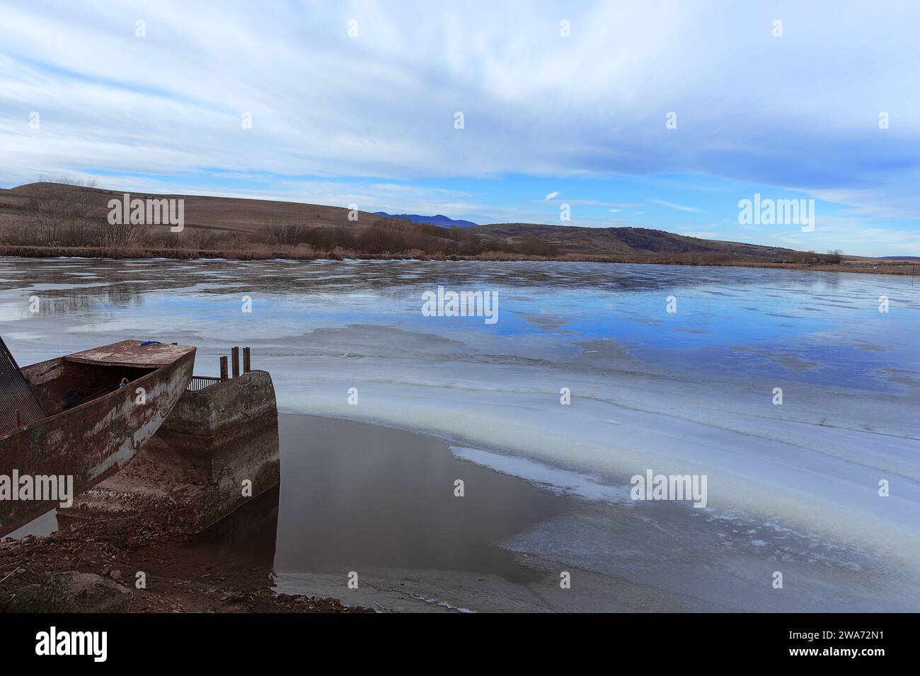 frozen lake in a winter cold day Stock Photo