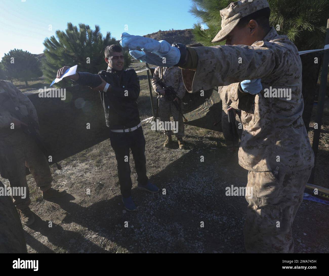 US military forces. 151026AW179-031 DOGANBEY, Turkey (Oct. 26, 2015) – A U.S. Marine with Combat Logistics Battalion 26, 26th Marine Expeditionary Unit (MEU), guides a role-player through an advanced weapons and contraband search as part of a non-combatant evacuation operation training exercise during Exercise Egemen 2015 Oct. 26. Egemen is a Turkish-led and hosted amphibious exercise designed to increase tactical proficiencies and interoperability among participants. Turkish Marines and sailors acted as non-combatants to enhance the training and experience it first-hand. (U.S. Marine Corps ph Stock Photo