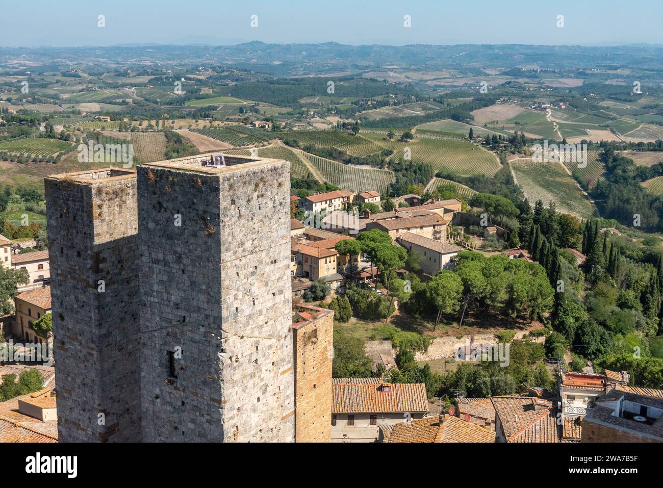 Wide panoramic view over downtown San Gimignano, Torri dei Salvucci in the center, seen from Torre Grosso, Italy Stock Photo