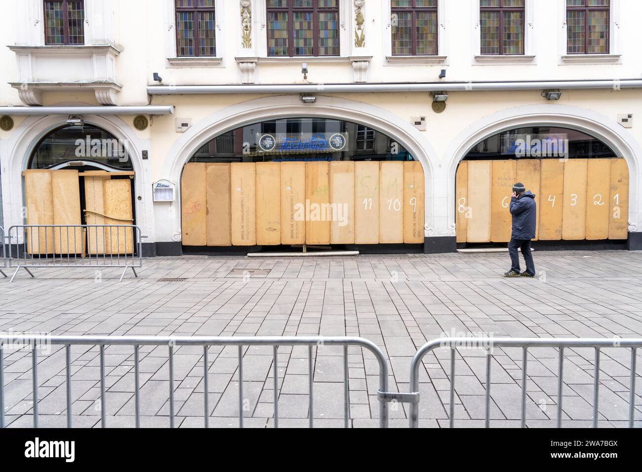 Rose Monday parade in Düsseldorf, street carnival, before the parade in the old town, shops and restaurants have barricaded their shop windows, Stock Photo