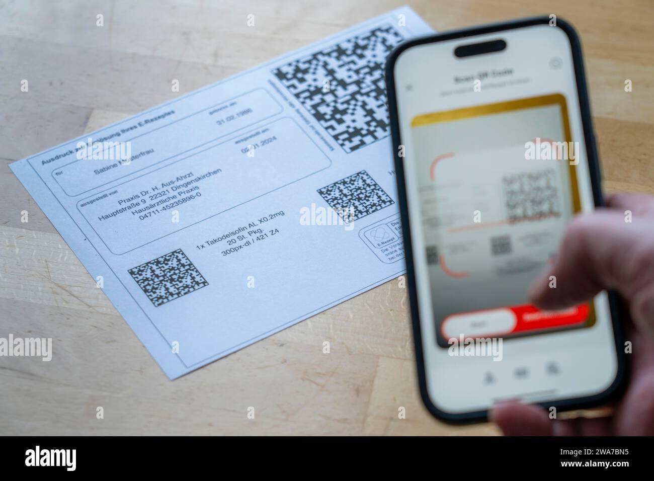 Symbolic image of an e-prescription, prescription issued by a doctor, with QR code, is scanned using a mobile phone and a special app, the code is the Stock Photo