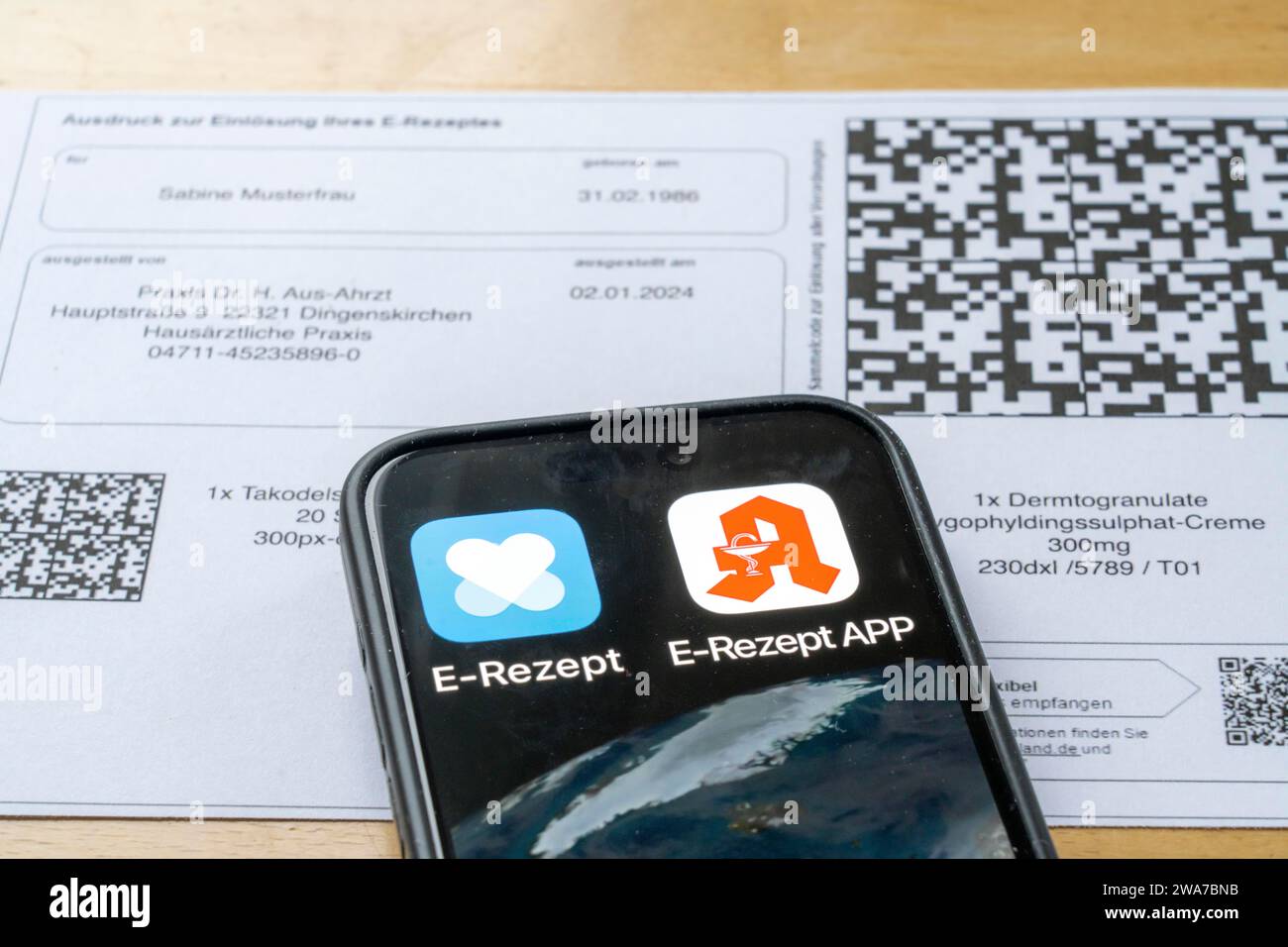 Symbolic image of an e-prescription, prescription issued by a doctor, with QR code, is scanned using a mobile phone and a special app, the code is the Stock Photo