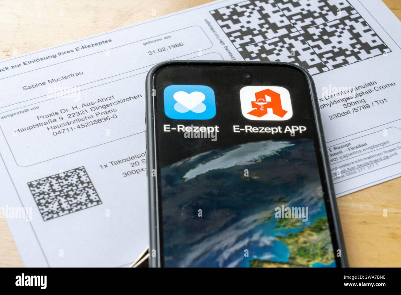 Symbolic image of an e-prescription, prescription issued by a doctor, with QR code, is scanned using a mobile phone and a special app, the code is the Stock Photo