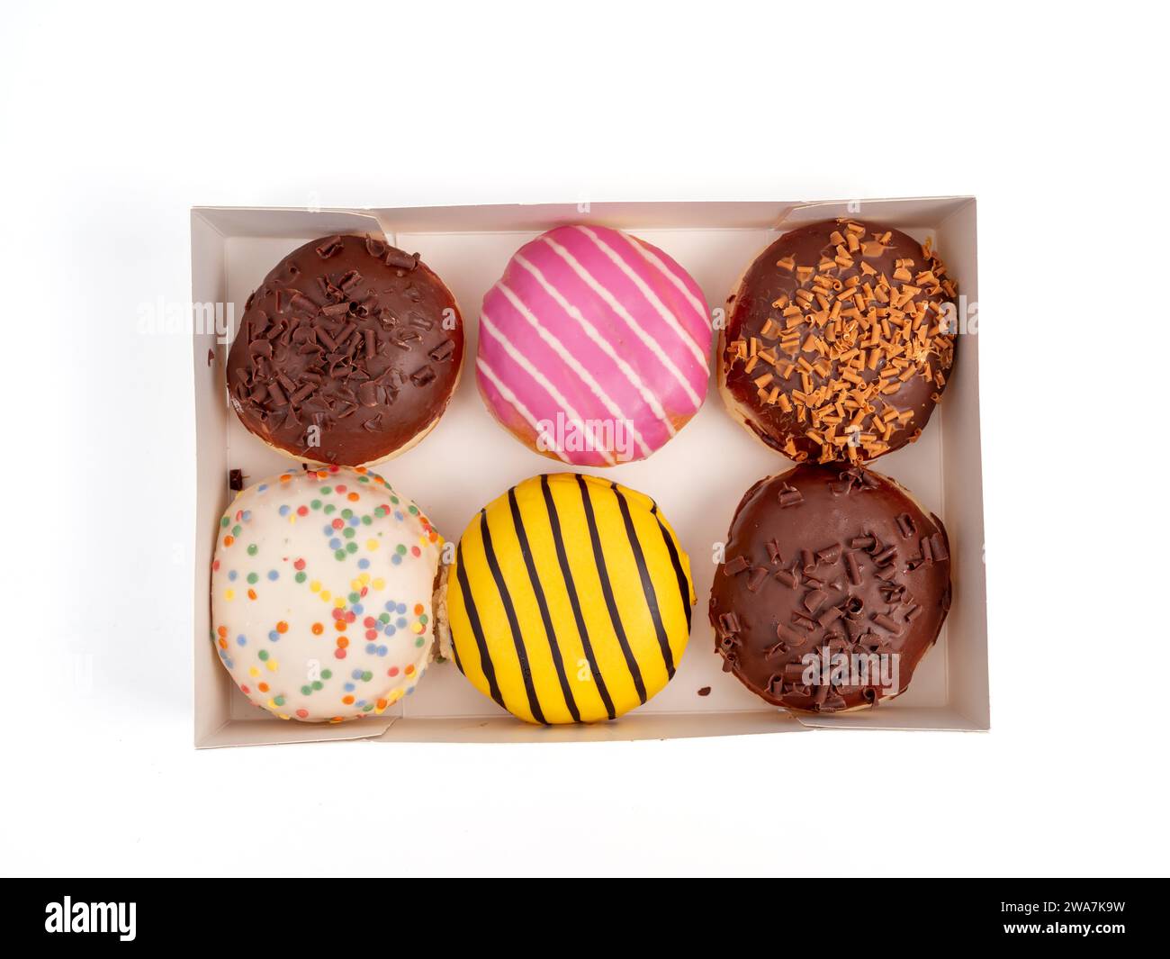 Cardboard box with donuts of different flavors isolated on a white ...