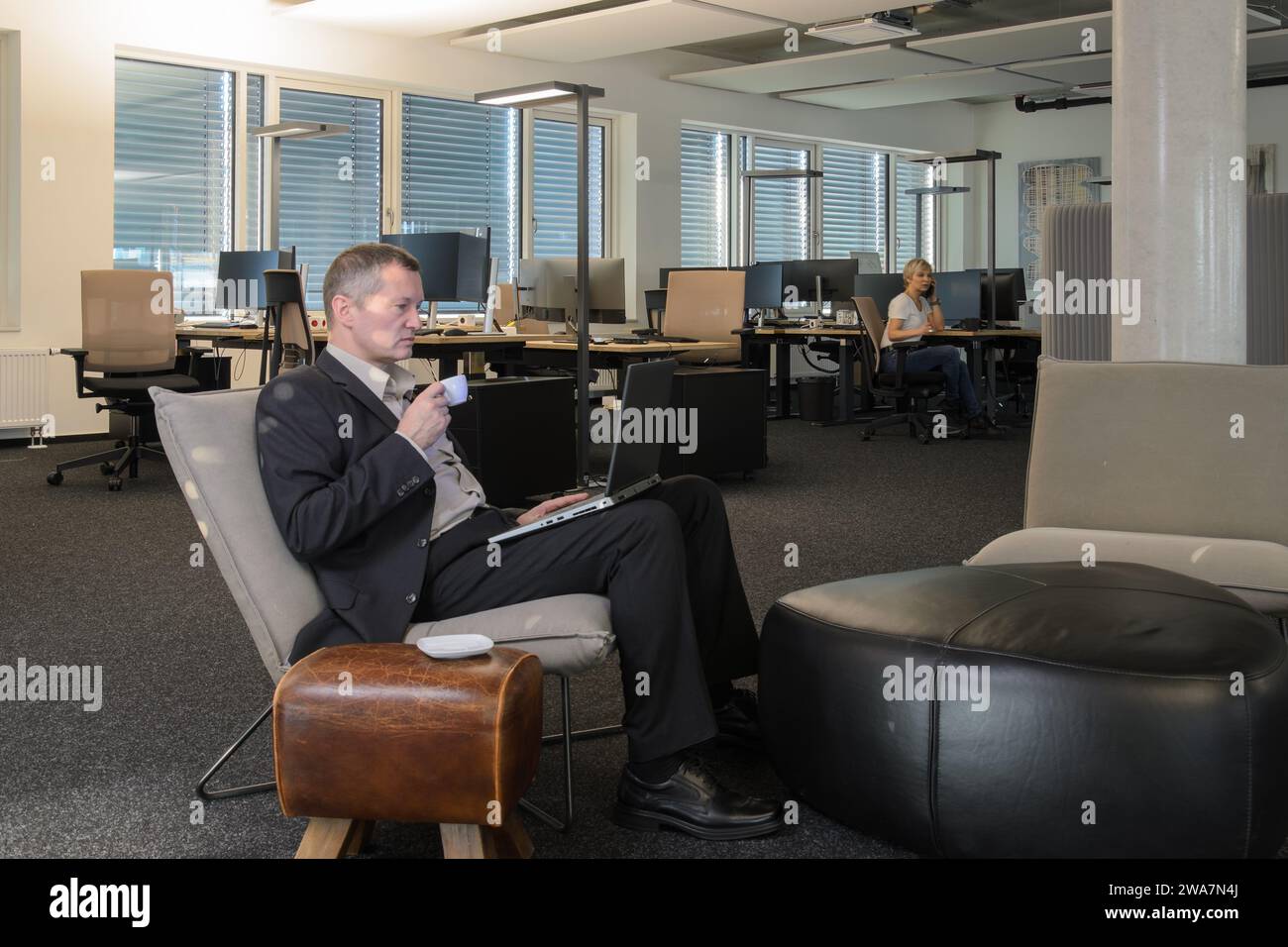 Employees at work in a modern IT office Stock Photo