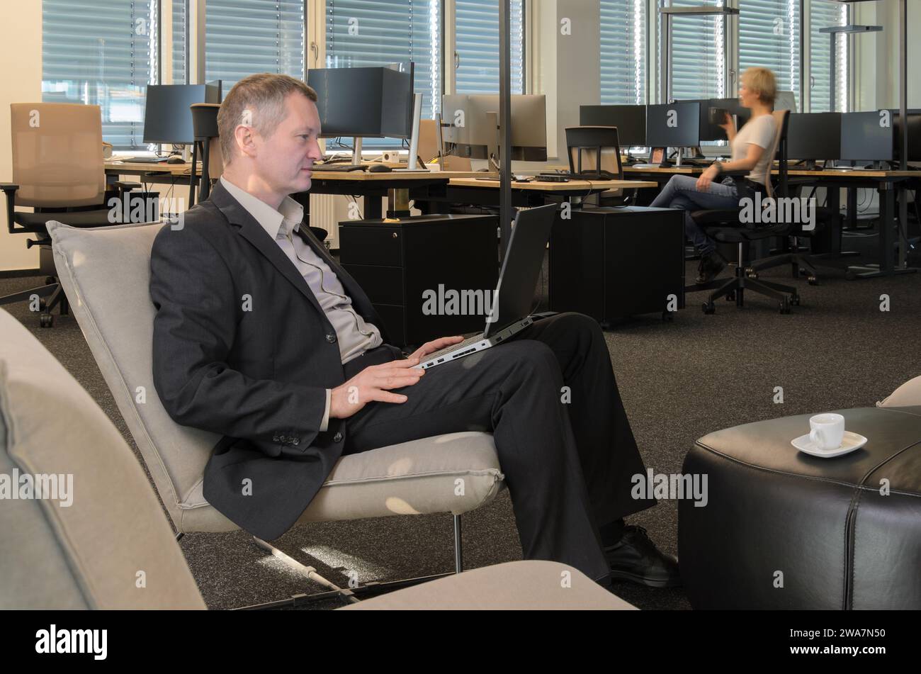 Employees at work in a modern IT office Stock Photo