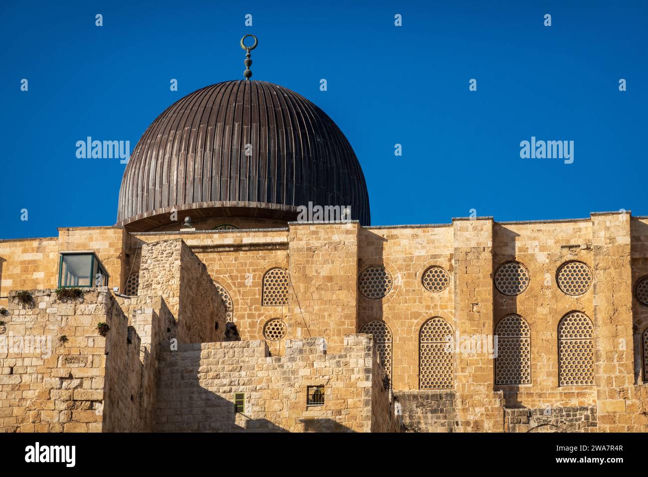 Al-Aqsa Mosque seen from the Western Wall under blue sky, Jerusalem, Israel Stock Photo