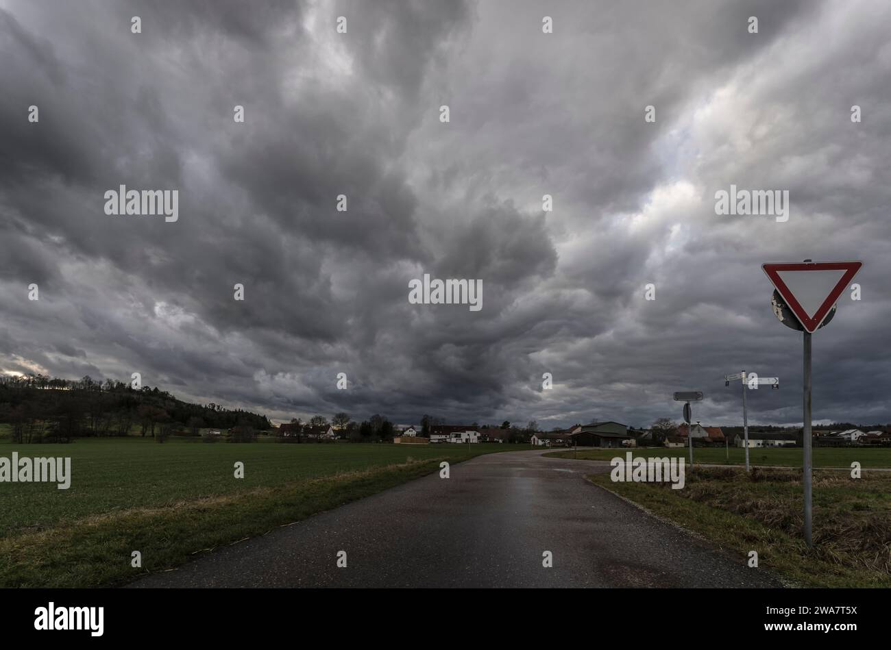 Dramatic storm clouds in a rural landscape. Stock Photo