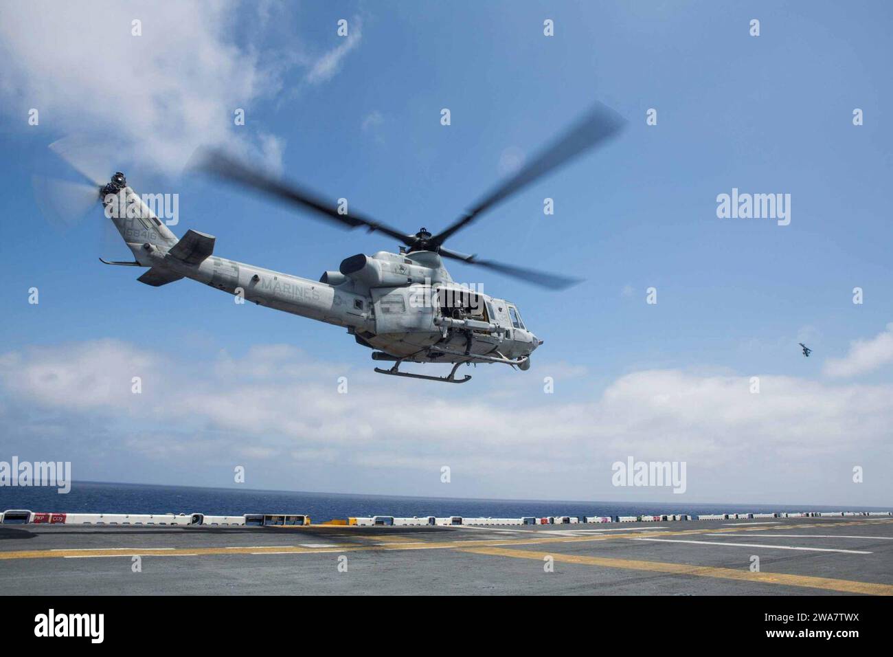 US military forces. 160708AF202-122 ATLANTIC OCEAN (July 8, 2016) Marines assigned to Marine Medium Tiltrotor Squadron 264 (Reinforced), and 2nd Radio Battalion Detachment, 22nd Marine Expeditionary Unit (MEU), take off from the flight deck of the amphibious assault ship USS Wasp (LHD-1) to conduct the first operational flight of the Intrepid Tiger II (V)3 Electronic Warfare pod. The Intrepid Tiger II EW is a network-enabled family of systems that provides a RDC (Rapid Deployment Capability) to support ground combat operations. 22nd MEU, deployed with the Wasp Amphibious Ready Group, is conduc Stock Photo