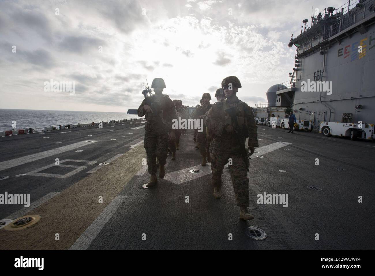 US military forces. 160718AF202-042 MEDITERREANEAN SEA (July 18, 2016) Marines assigned to Battalion Landing Team, Headquarters and Service Company, 1st Battalion, 6th Marine Regiment, 22nd Marine Expeditionary Unit (MEU), hike aboard the USS Wasp (LHD-1) July 18, 2016. 22nd MEU, deployed with the Wasp Amphibious Ready Group, is conducting naval operations in the 6th Fleet area of operations in support of U.S. national security interests in Europe. (U.S. Marine Corps photo by Lance Cpl. Koby I. Saunders) Stock Photo