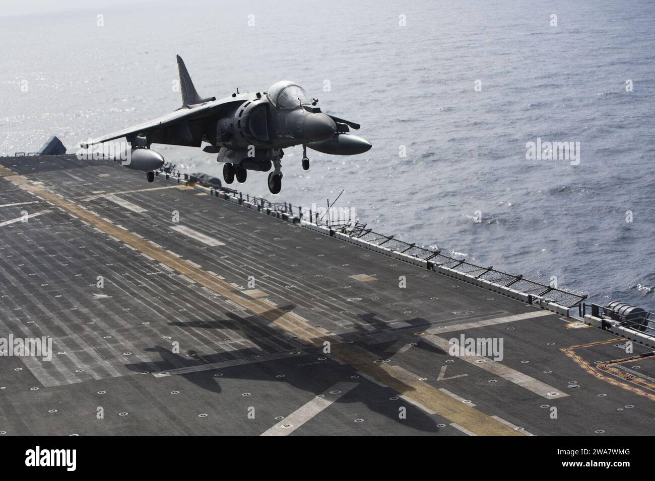 US military forces. An AV-8B Harrier II with Marine Medium Tiltrotor Squadron 264 (Reinforced), 22nd Marine Expeditionary Unit (MEU), lands on the flight deck of the amphibious assault ship USS Wasp (LHD-1) on July 18, 2016. The 22nd Marine Expeditionary Unit, Deployed with the Wasp Amphibious Ready Group, is conducting naval operations in support of U.S. national security interests in Europe. (U.S. Marine Corps photo by Cpl. John A. Hamilton Jr.) Stock Photo