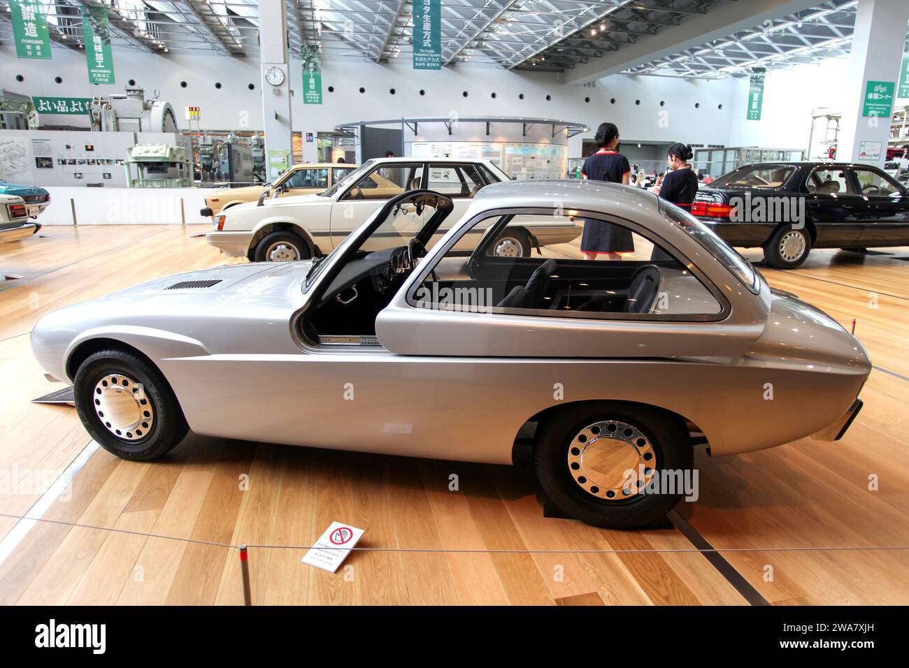Interior of the Toyota Commemorative Museum of Industry and Technology in Nagoya, Japan. The 1962 Toyota Publica Sports is being displayed. Stock Photo