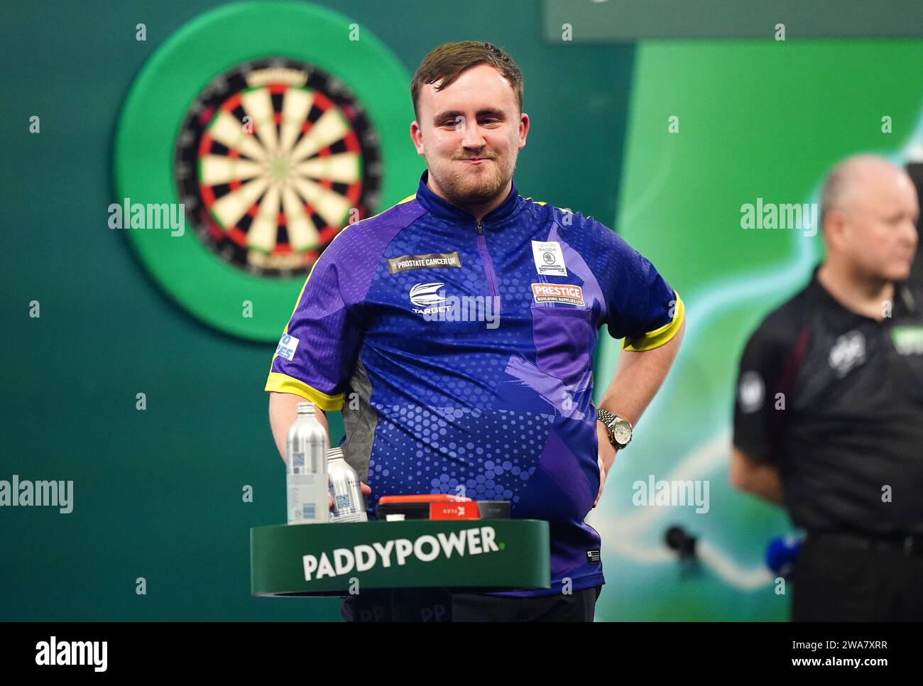 Luke Littler celebrates victory in the semifinal against Rob Cross on