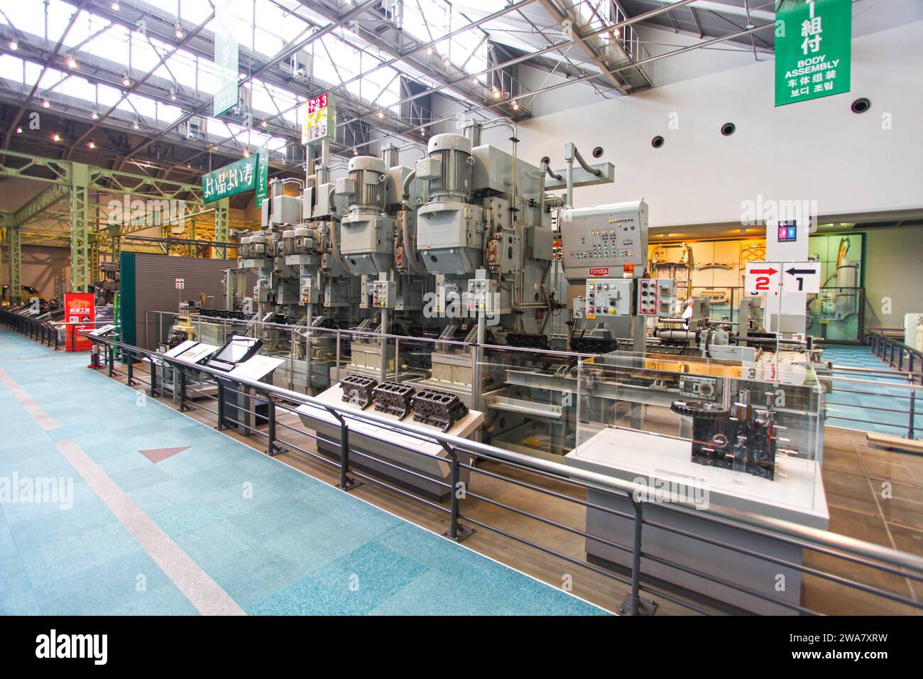 Inside the Toyota Commemorative Museum of Industry and Technology in Nagoya, Japan.with heavy machinery used in car manufacture in the past. Stock Photo
